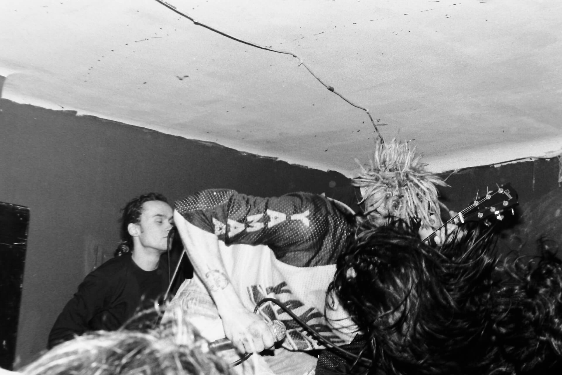 Band member headbanging on stage