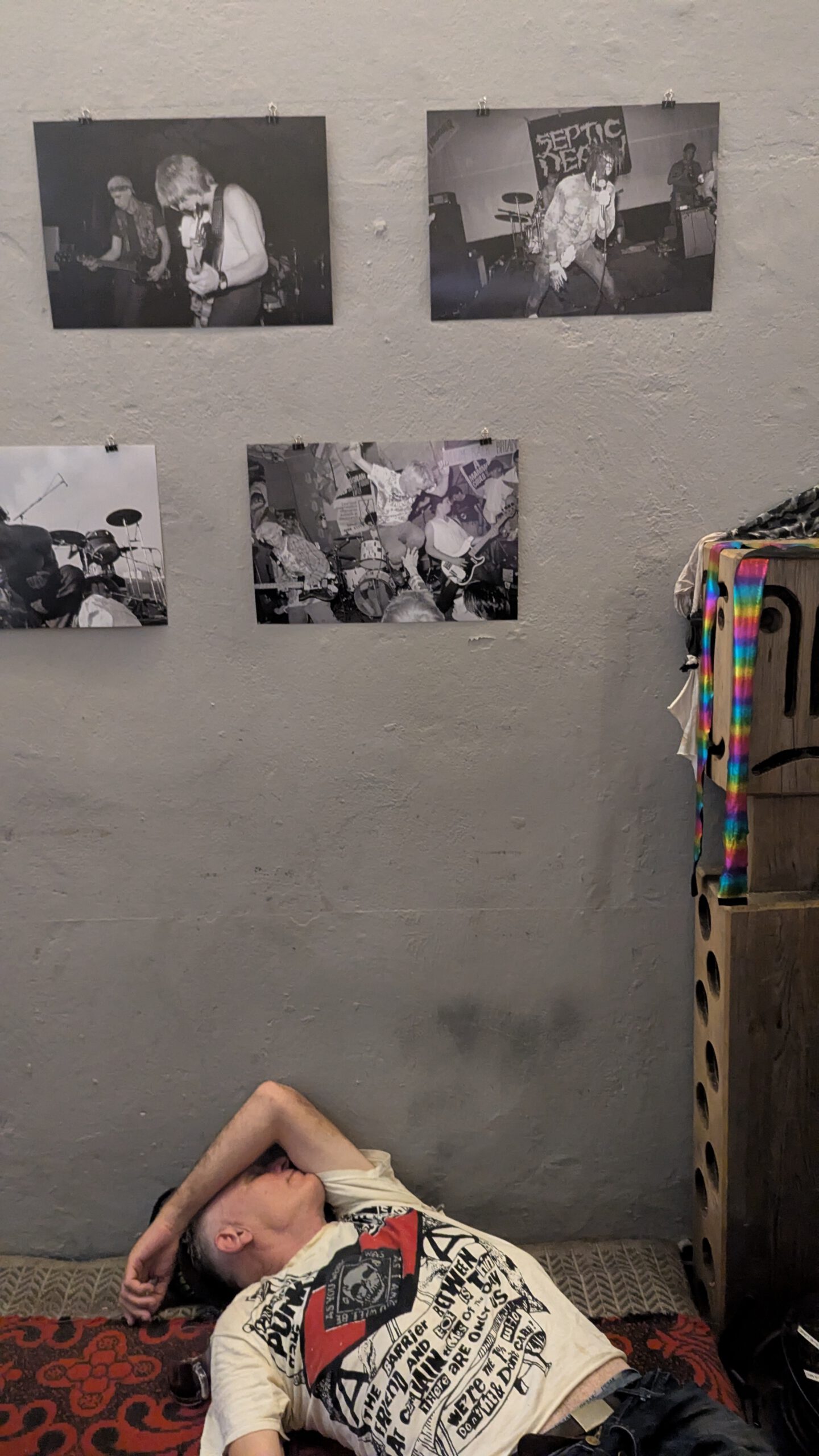 pictures of a photo exhibition with sleeping person