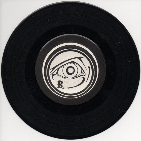 B-side label with eye artwork